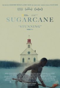 Film poster for Sugarcane showing a shirtless man holding a shovel in the foreground, with a small white church rising from misty blue water behind him.